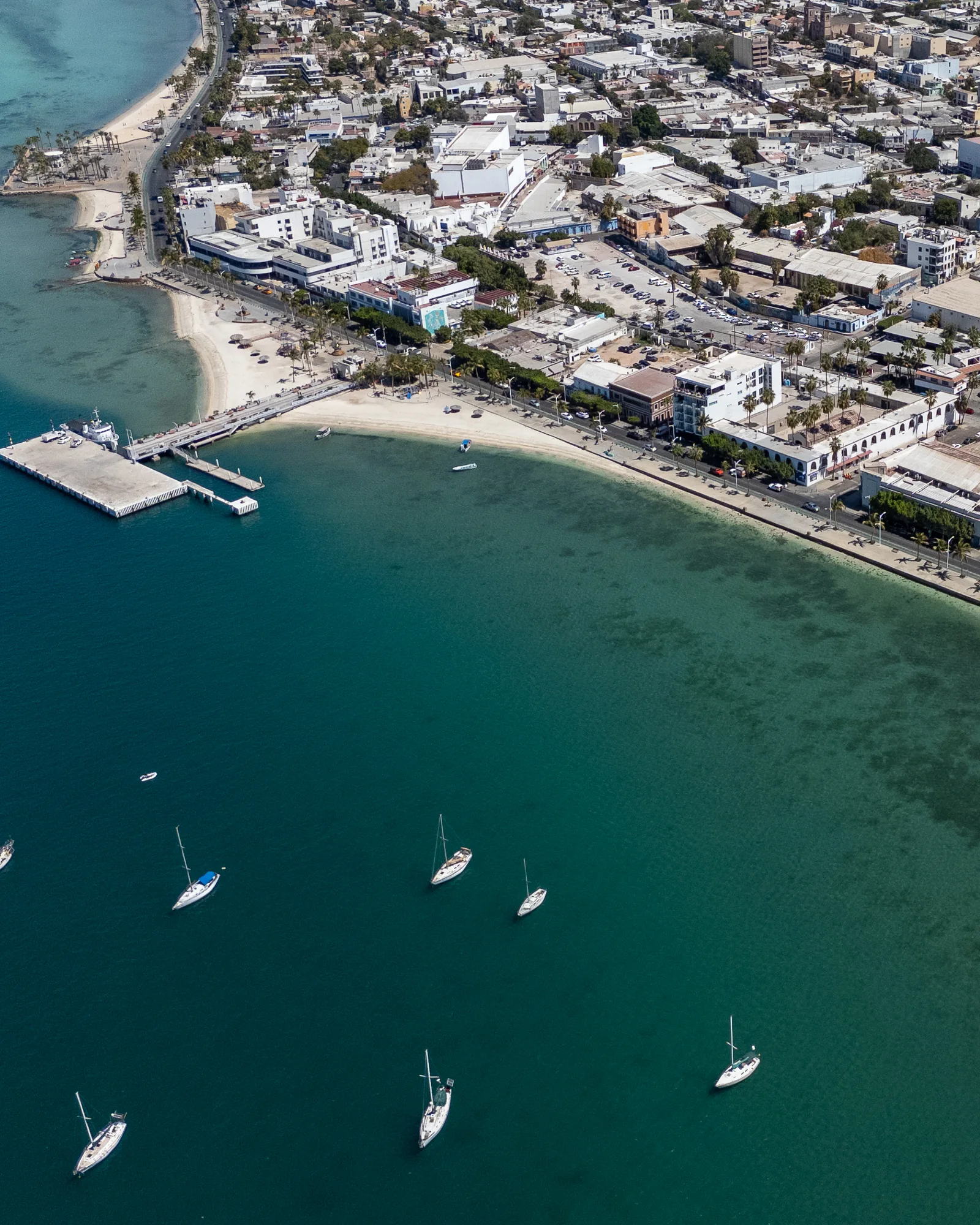 Aerial view of the La Paz waterfront and its turquoise bay.